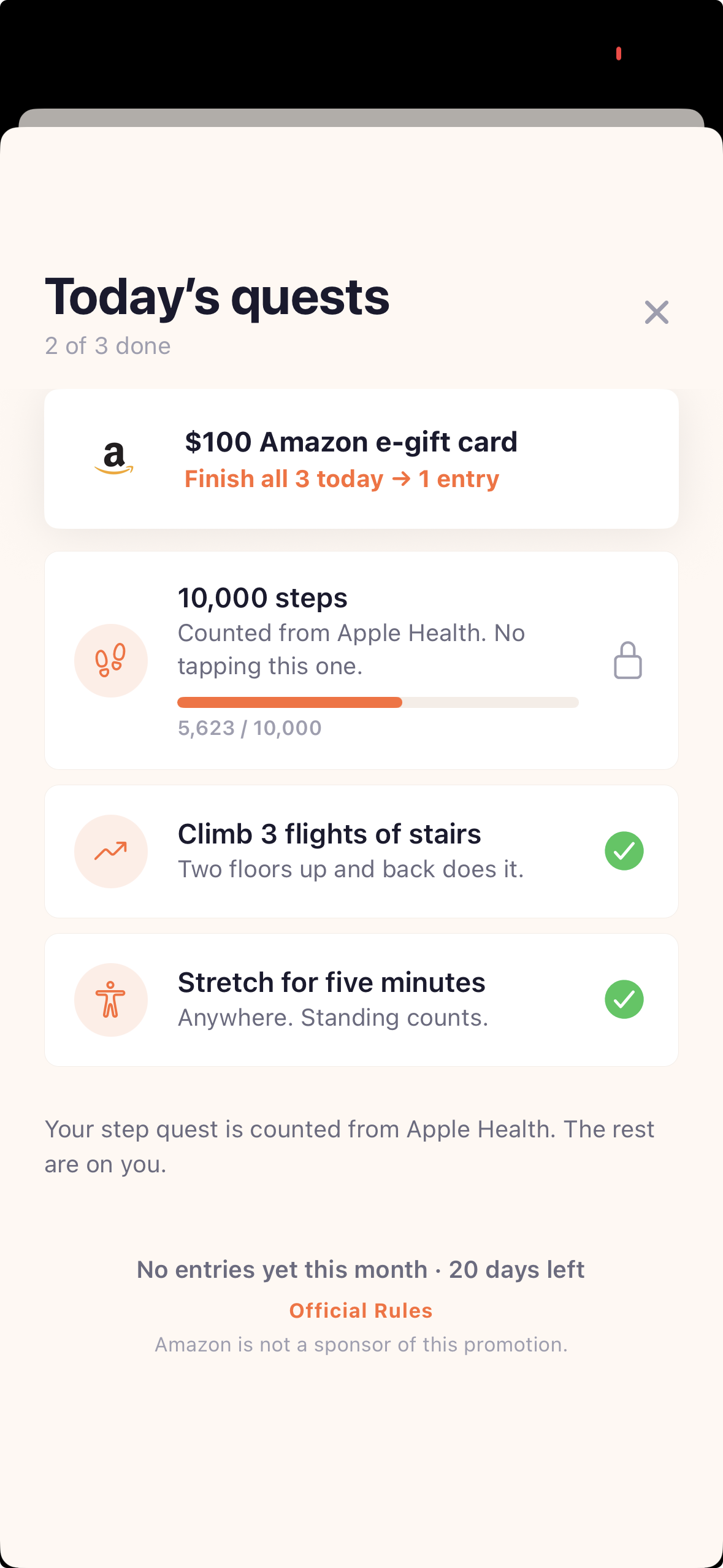 StepRank daily quests screen showing two of three quests done — a step target counted from Apple Health, three flights of stairs, and a five minute stretch — above the entry card for that month's prize